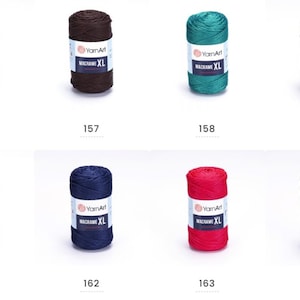 May include: Ten spools of YarnArt Macrame XL yarn in various colors, including beige, brown, teal, gray, purple, navy blue, red, and olive green.