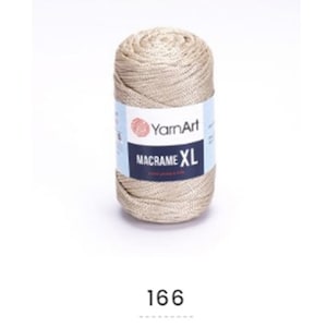 May include: Three spools of yarn in different colors: beige, gold, and purple. Each spool has a label that reads "YarnArt Macrame XL".