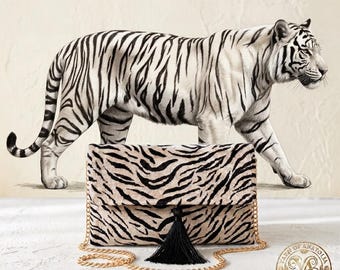 Fluwelen clutch, zebraprint, gouden ketting, garentas, tijgermodel