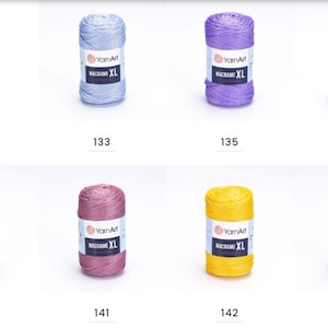 May include: Eight spools of YarnArt Macrame XL yarn in various colors, including beige, light blue, purple, cream, blue, pink, yellow, and red.