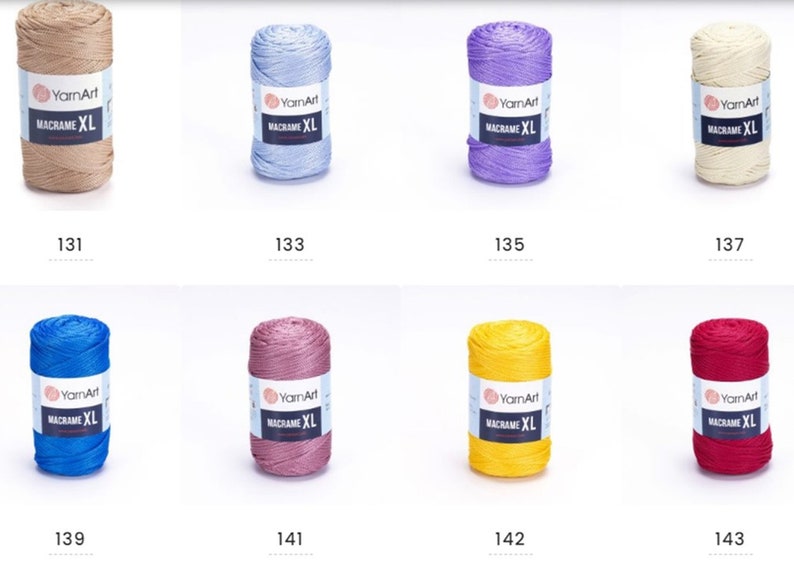 May include: Eight spools of YarnArt Macrame XL yarn in various colors, including beige, light blue, purple, cream, blue, pink, yellow, and red.