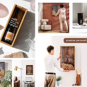 May include: A wooden box with a glass front displays a bottle of champagne. The box has the text "Pairs well with getting engaged" printed on the side. The box is sitting on a white surface.