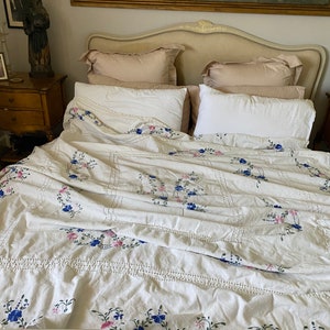 Hand embroidered vintage linen bedspread. English, floral embroidery.