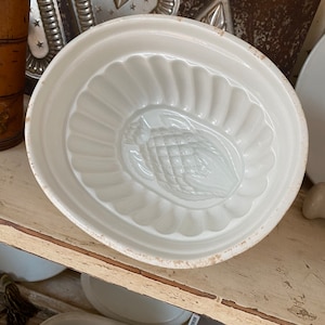 Antique ironstone thistle jelly mould.