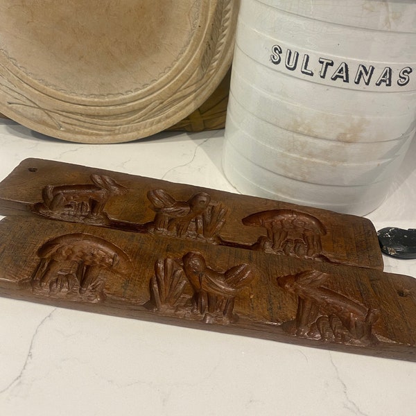 Sweet early twentieth century chocolate mould. Shapes of a sheep, bird and a rabbit.