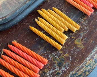 Vintage coloured taper candles. 2 sets of 6, 1 set of 7. 3 sets available. Priced per set.