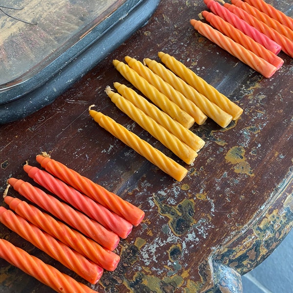 Vintage coloured taper candles. 2 sets of 6, 1 set of 7. 3 sets available. Priced per set.