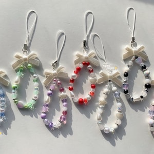 Kawaii coquette white bow phone charm | beaded blue green purple red white black pink cute aesthetic keychain pearl heart star cottagecore