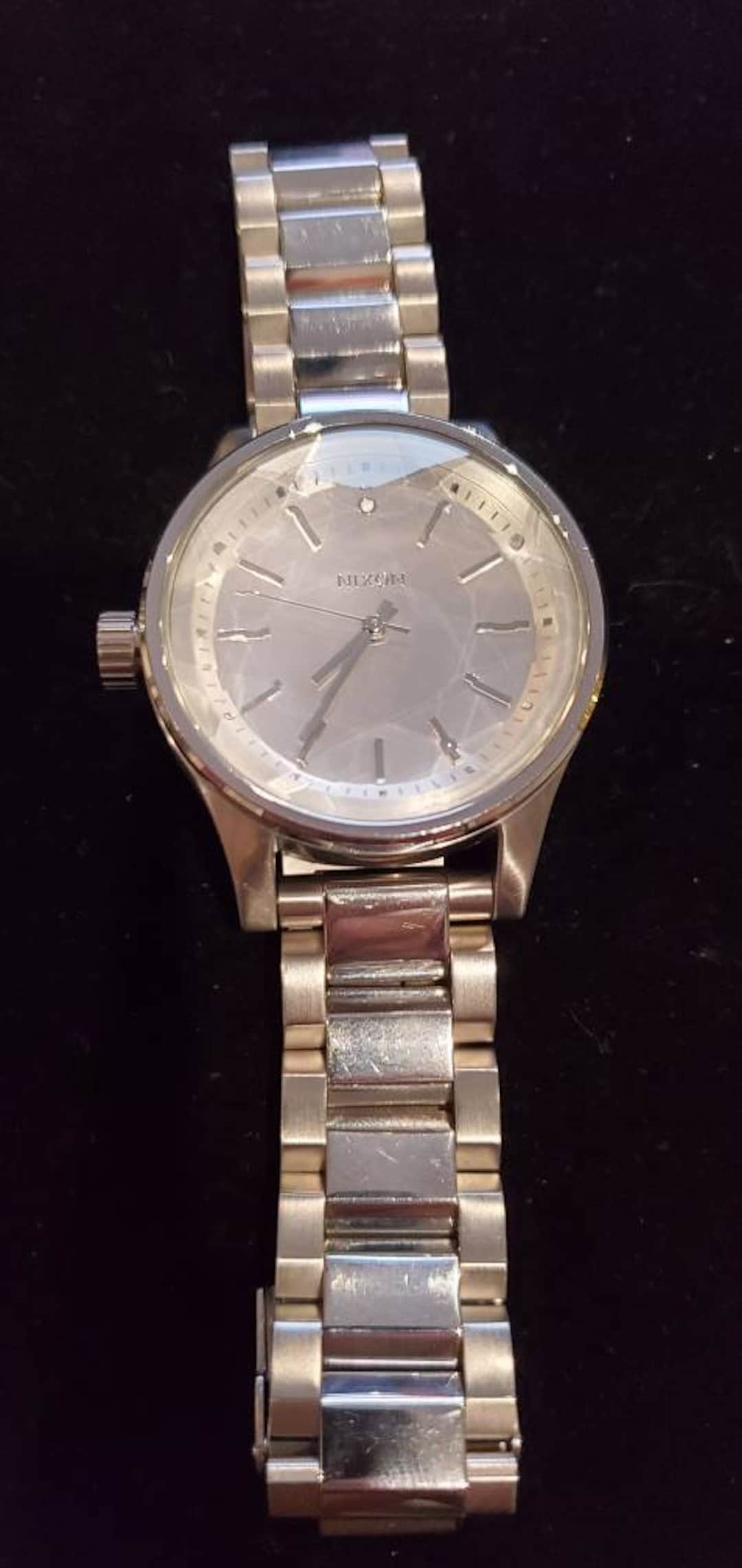 Nixon facet 38 gold hot sale