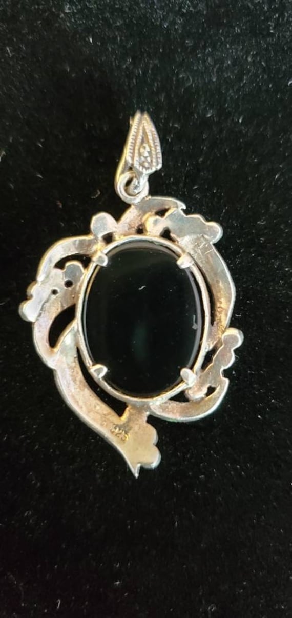 Black onyx cameo on sale pendant