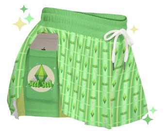 Puede incluir: Falda deportiva verde con un patrón de cuadros y cintura con cordón. La falda presenta un bolsillo con un gráfico y el texto "Sul Sul". El diseño incluye formas de diamante y rayas verticales.