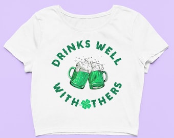 Drinks Well With Others Crop Top | Cute Funny Fitted Graphic Top | Irish Green Beer Baby Tee | Gift For Girlfriend | St Patricks Day Gift