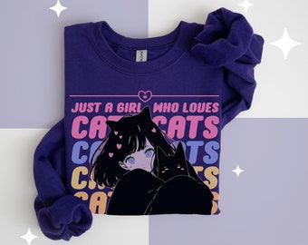 May include: Purple sweatshirt with a graphic of an anime girl with cat ears holding a black cat. The text "Just a girl who loves cats" is printed on the sweatshirt in pink, yellow, and blue.