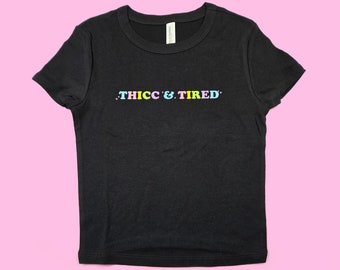 Thicc and Tired Crop Top | Cute Rainbow Baby Tee, Trendy Fitted Graphic Top | Y2K Baby Tee | Gift For Girlfriend | Funny Cute Gift For Her