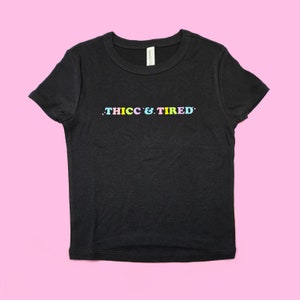 Thicc and Tired Crop Top | Cute Rainbow Baby Tee, Trendy Fitted Graphic Top | Y2K Baby Tee | Gift For Girlfriend | Funny Cute Gift For Her