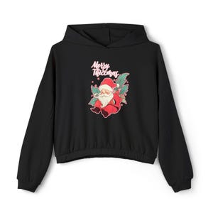May include: Black hooded sweatshirt with a Christmas-themed graphic featuring Santa Claus and the text "Merry Christmas" in pink.