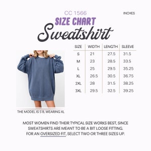 Op de afbeelding: Maattabel voor een sweatshirt in maten S tot en met 3XL. De tabel toont de breedte, lengte en mouwlengte in inches voor elke maat.