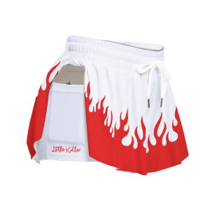 May include: White athletic shorts with a red flame design. The shorts have a built-in pocket and a drawstring waist. The text "Little Killer" is printed on the shorts.