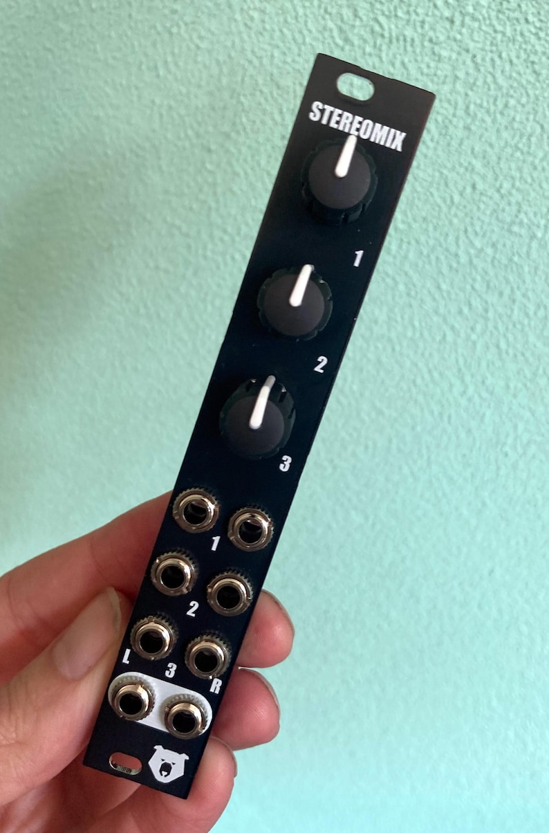May include: Black stereo mixer with three knobs and three sets of 1/4 inch jacks labeled 1, 2, and 3. The mixer has the text "STEREOMIX" printed on the front.