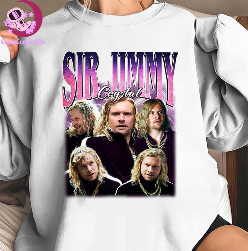 May include: White crew neck sweatshirt featuring a graphic of a band with the text "SIR JIMMY Crystal" in a retro style. The graphic has a purple and pink gradient background and images of the band members.