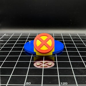 Non human team symbol action figure stand
