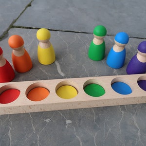 Breadboard with elves in rainbow colors made of wood | Waldorf Montessori inspires sorting and color theory