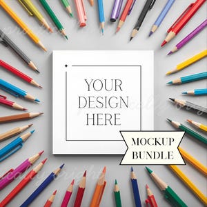 May include: A square white card with the text "YOUR DESIGN HERE" and a banner that says "MOCKUP BUNDLE" is surrounded by colorful pencils on a gray background. The pencils are various colors, including red, yellow, green, and blue.