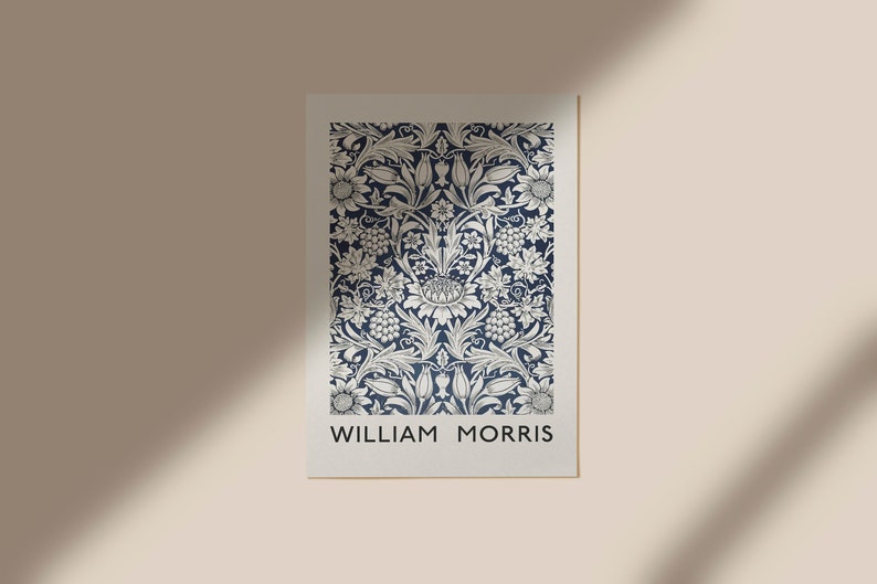 May include: A navy blue poster with a white floral pattern and the text "WILLIAM MORRIS" at the bottom.