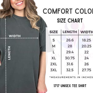 May include: A dark gray unisex t-shirt with a size chart. The chart shows measurements in inches for sizes S to 3XL. The shirt is labeled as a 1717 unisex tee shirt.
