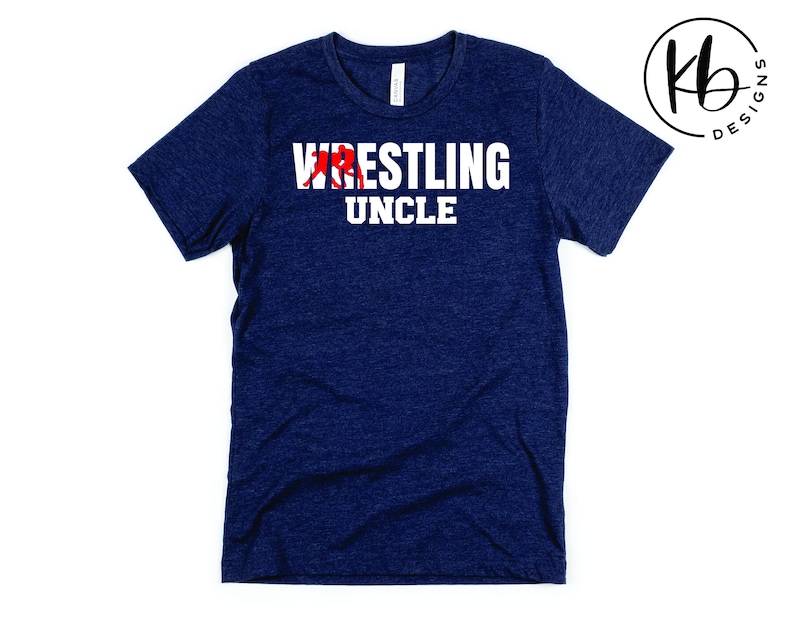 May include: A navy blue t-shirt with the text "Wrestling Uncle" in white letters. A red wrestler graphic is above the text.