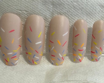 Presse Sprinkles sur les ongles