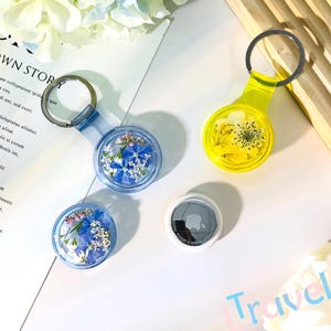 Getrocknete gepresste Blume Airtag Hülle, Airtag wasserdichte klare Hülle für Geldbörse, Ortungsgerät, Schlüsselbund, Haustierhalsband, Bluetooth-Headset-Box, Gepäck