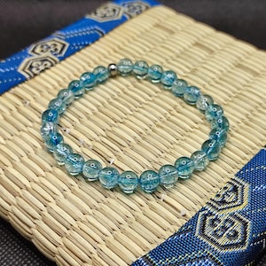 Blue topaz bracelet, 6 mm pearls