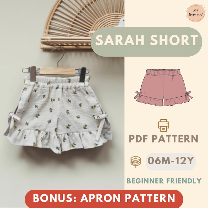May include: A pair of white shorts with a floral pattern and a ruffled hem, displayed on a hanger. The image also features a pink illustration of shorts, a PDF pattern icon, and the text "SARAH SHORT".
