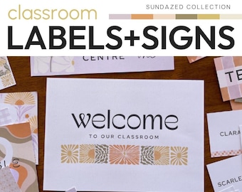 May include: A set of printable classroom labels and signs with a modern, minimalist design. The labels feature a welcome sign with the text "Welcome to our classroom" and a floral pattern in shades of peach, brown, and cream. The signs are easy to edit and personalize.
