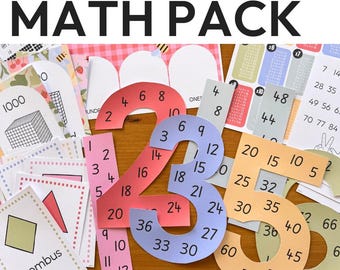 May include: A colorful math pack with the words "MATH PACK" at the top. The image features various educational materials, including number cutouts, multiplication tables, and geometric shapes. The numbers are in various colors and sizes, perfect for classroom use.