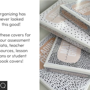 May include: Four white binders with black and white patterned covers. The covers have different titles, including "Reading Growth", "Math Growth", "Student Data", and "Professional Development".