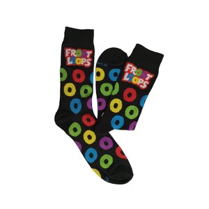 May include: Black socks with colorful, circular designs and the text "Froot Loops" in a red, white, and green box. The socks feature a pattern of various colored circles, including red, yellow, green, blue, and purple.