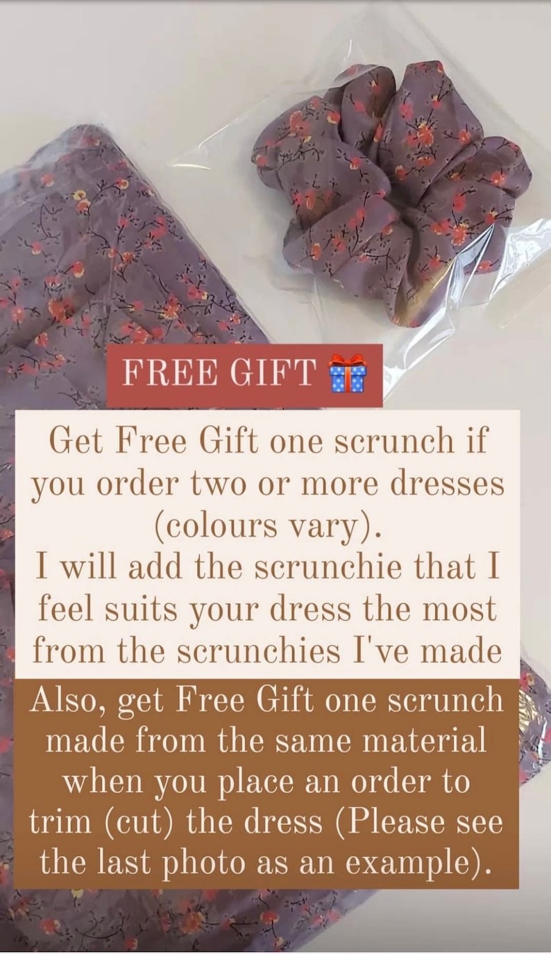 May include: A lavender fabric and scrunchie set with a floral pattern. The scrunchie is in a clear bag. The fabric and scrunchie have a lavender base with orange and pink floral accents. The text "FREE GIFT" is visible.