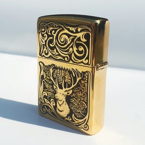 Zippo lighter in gold. Deer engraving. A gift for a man hunter an original memorable gift for a dear person