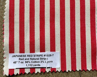 May include: Red and white striped fabric with a label that reads "JAPANESE RED STRIPE #1028-7 Red and Natural Stripe 45" 7 oz 98% Cotton 2% Lycra 1,112 yards"