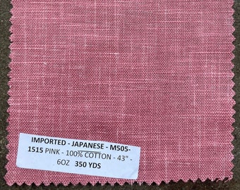 May include: A pink fabric swatch with a white label that reads "IMPORTED - JAPANESE - M505- 1515 PINK - 100% COTTON - 43" - 6OZ 350 YDS".