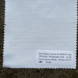 May include: White fabric swatch with a label that reads "Bull Denim Taiwan S# W903T1 PED 59%Poly 39%Model 2%S 3x1R Color forever White 10.5oz 50-52" 820 Yards".