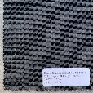 May include: A dark blue denim shirting fabric swatch with the text "Denim Shirting China S# CNYT0144 Color Super-DR Indigo 100%C 56-57" 3.5oz 3,980 Yards".