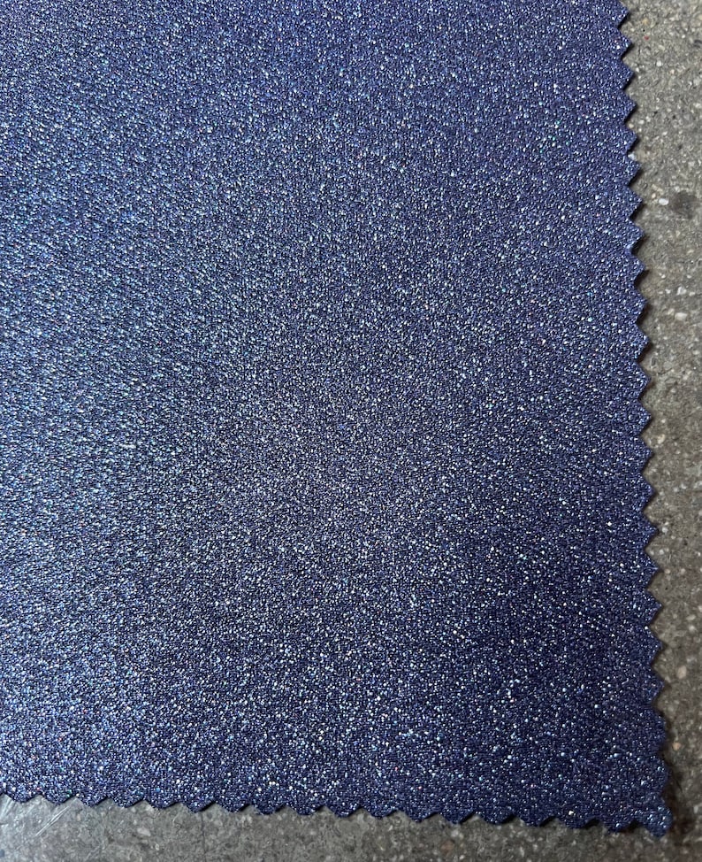 Italian Blue Sparkly Twill Stoff Bulk Stock 7,5 oz glänzend beschichtet Jeansstoff schwarz Rückseite Bild 1