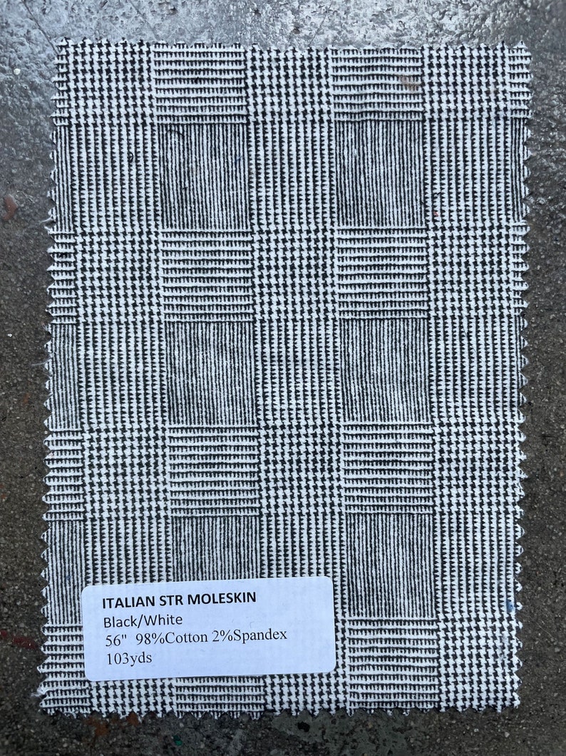 May include: Black and white Italian stretch moleskin fabric with a checkered pattern. The fabric is 56 inches wide and is made of 98% cotton and 2% spandex. It contains 103 yards.