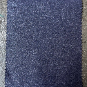 Italian Blue Sparkly Twill Stoff Bulk Stock 7,5 oz glänzend beschichtet Jeansstoff schwarz Rückseite Bild 2