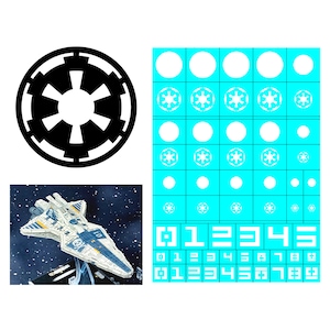 May include: The image shows a black and white Imperial symbol, a model spaceship, and a sheet of decals. The spaceship is white and blue with a skull and crossbones emblem. The decal sheet has white circles, Imperial symbols, and numbers.