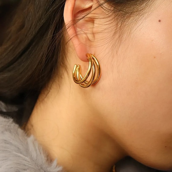 Three gold earrings sale