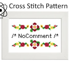 May include: Cross stitch pattern with red and yellow flowers and the text "/* NoComment */" in black.
